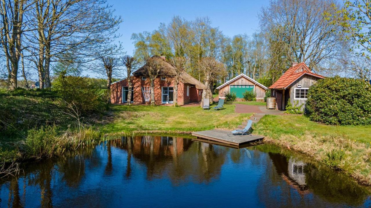 Villa Hübsches Reetdach-Ostfriesenhaus Südbrookmerland Exterior foto