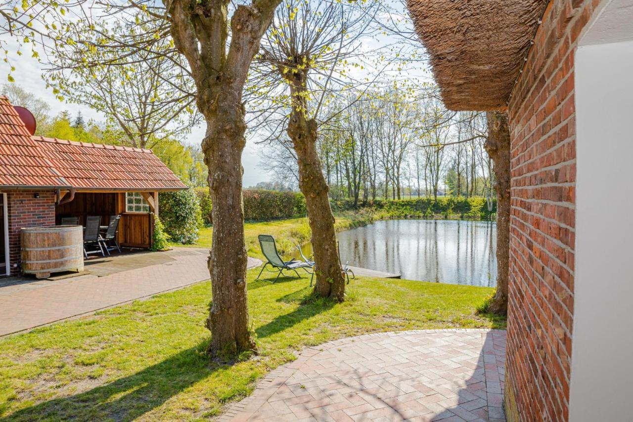 Villa Hübsches Reetdach-Ostfriesenhaus Südbrookmerland Exterior foto